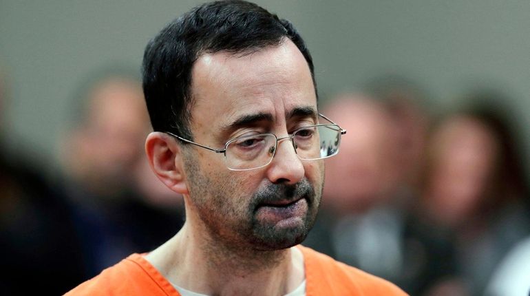 In this Nov. 22, 2017 file photo, Dr. Larry Nassar,...