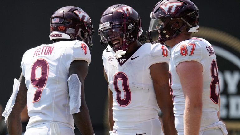 Virginia Tech wide receiver Ali Jennings (0) celebrates a touchdown...