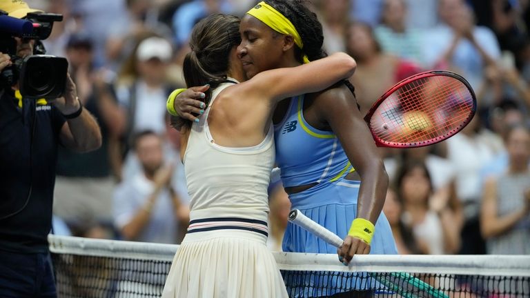 Emma Navarro, left, of the United States, embraces Coco Gauff,...