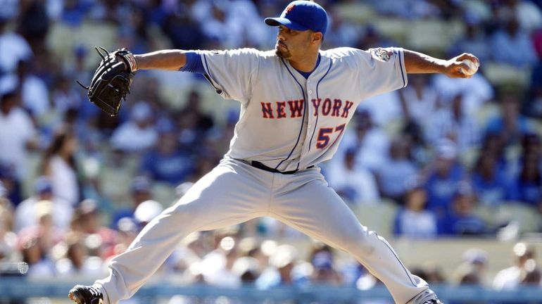 Johan Santana throws a pitch in the first inning. (June...