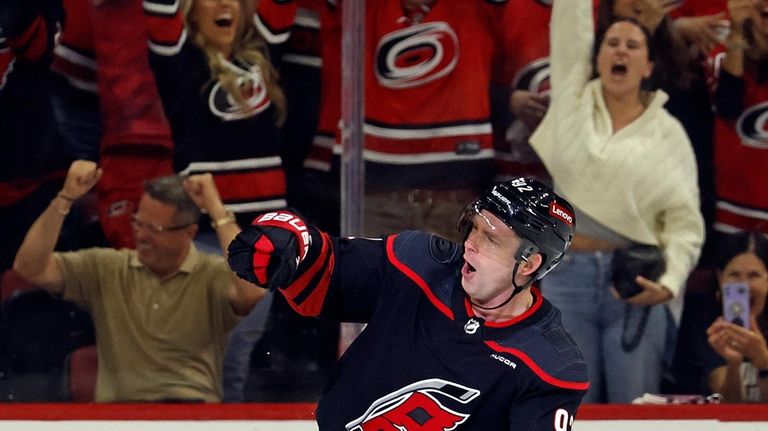 Carolina Hurricanes' Evgeny Kuznetsov (92) celebrates his penalty shot goal...