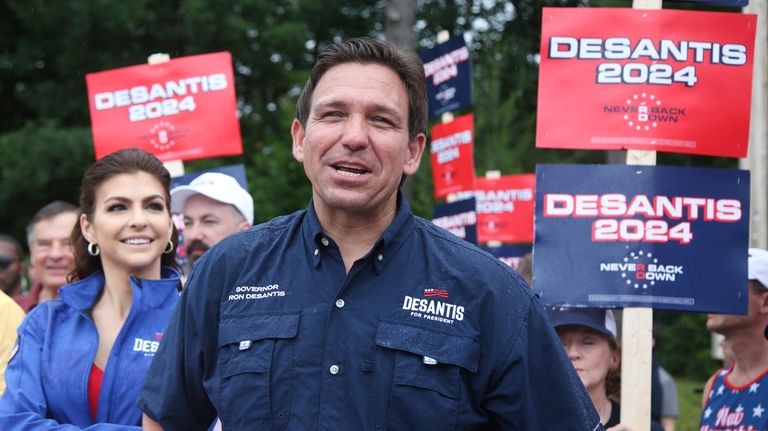 Republican presidential candidate and Florida Gov. Ron DeSantis and his...