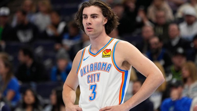 Oklahoma City Thunder guard Josh Giddey (3) stands on the...