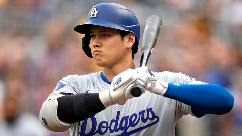 Los Angeles Dodgers' Shohei Ohtani waits on deck during the...