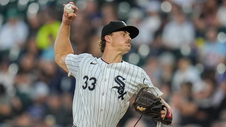 Chicago White Sox starting pitcher Drew Thorpe throws against the...