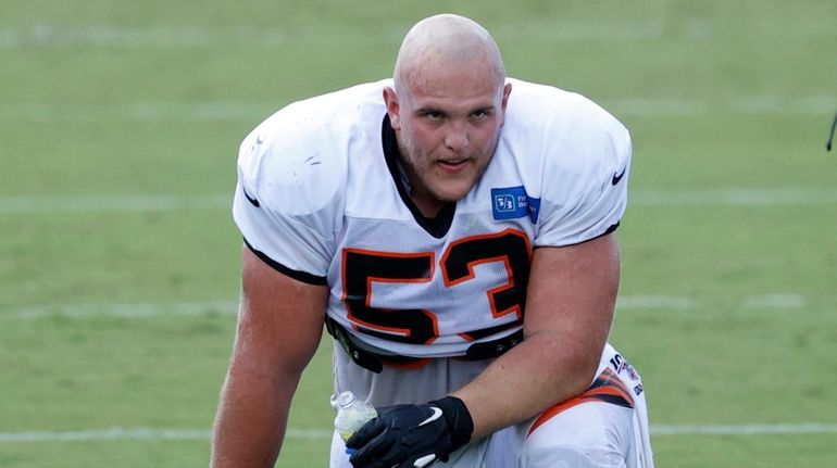 Billy Price looks on during training camp workouts on the practice...