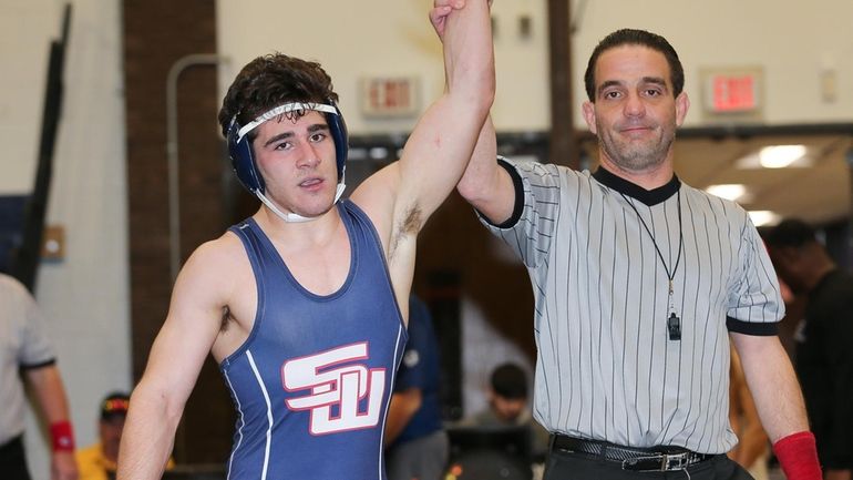 Smithtown West’s Peter Graham defeats Deer Park’s Brandon Bailey in...