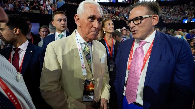 Roger Stone walks on the convention floor during the Republican...