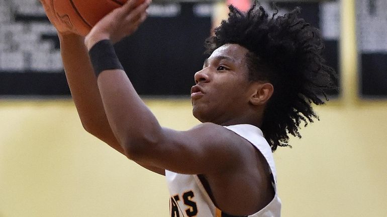 Uniondale freshman Jo-Jo Wright shoots a jumper during a Nassau Conference AA-I boys...