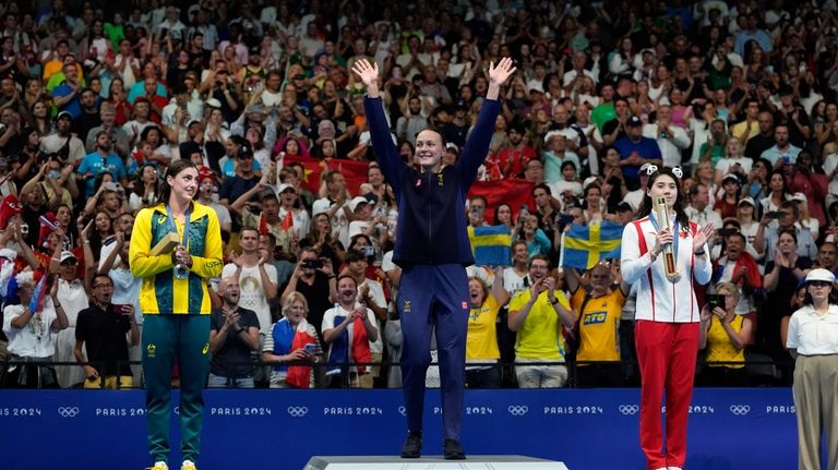 Australia's Meg Harris, from left, Sweden's Sarah Sjoestroem and China's...