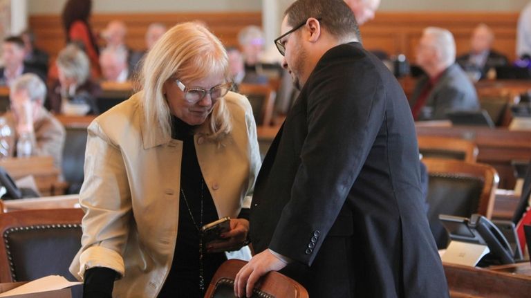 Kansas state Reps. Susan Concannon, right, R-Beloit, and Nick Hoheisel,...