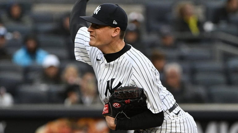 New York Yankees' Ron Marinaccio pitches during the seventh inning