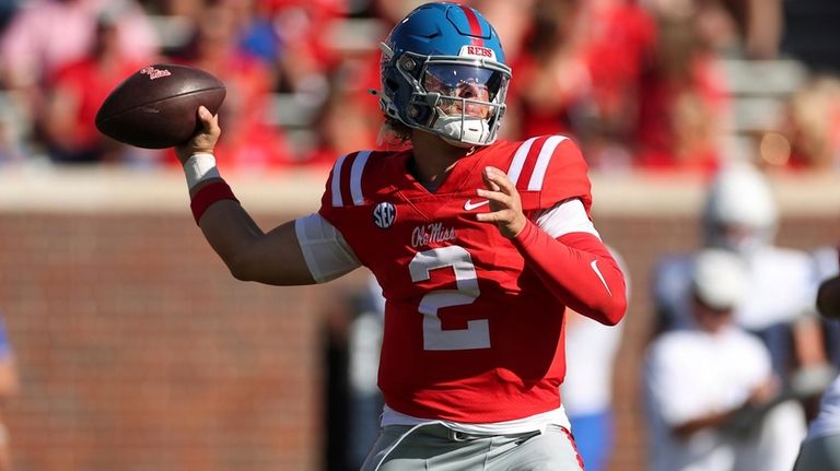 Mississippi quarterback Jaxon Dart (2) throws the ball during the...