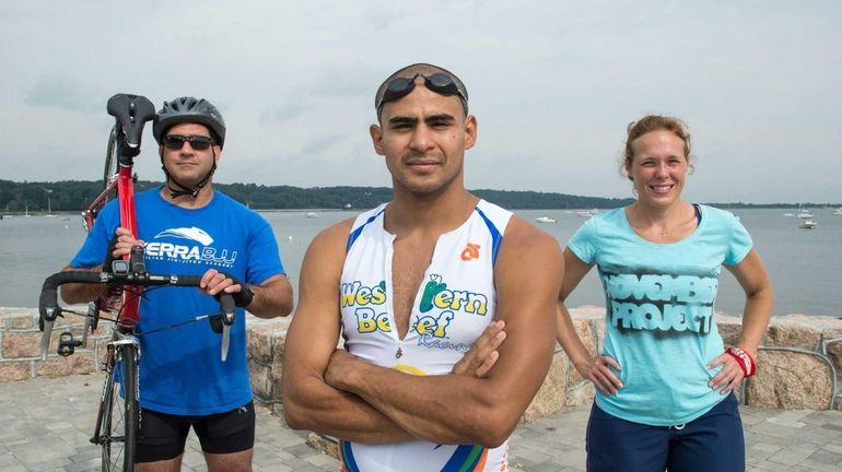 Triathletes Dave Patton, 46, left, Julian Acevedo, 26, center, and...