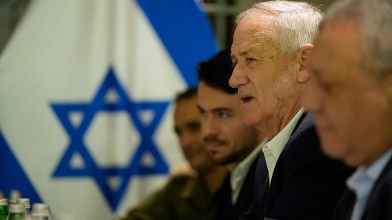 Former Israeli Defense Minister Benny Gantz, second right, meets with...