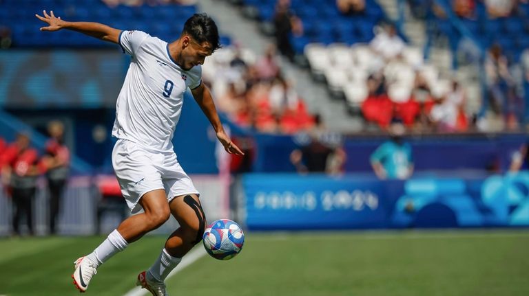 Dominican Republic's Nunez Rafael controls the ball during the men's...