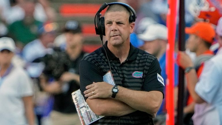 Florida head coach Billy Napier paces the sideline during the...