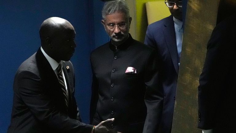 India's Foreign Minister Subrahmanyam Jaishankar is escorted to address the...