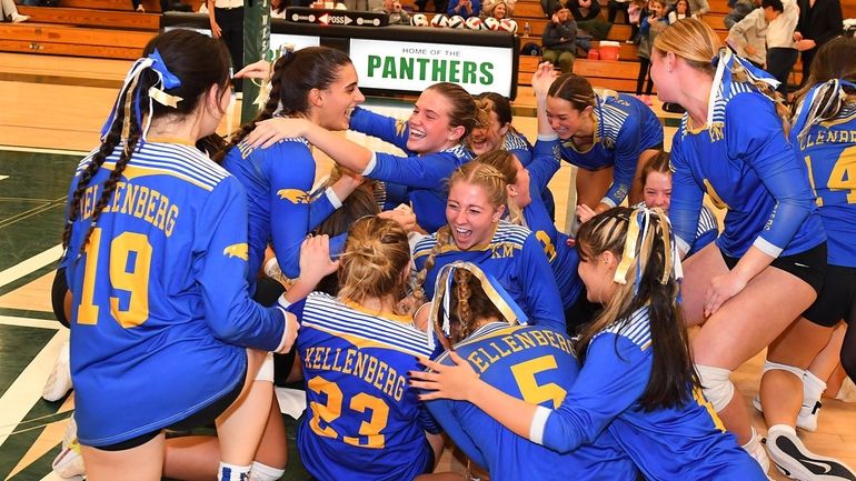 Kellenberg celebrates its win in the CHSAA girls volleyball final between...