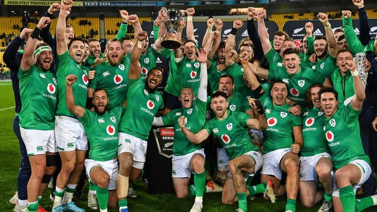 Ireland players celebrate after their first ever series win over...