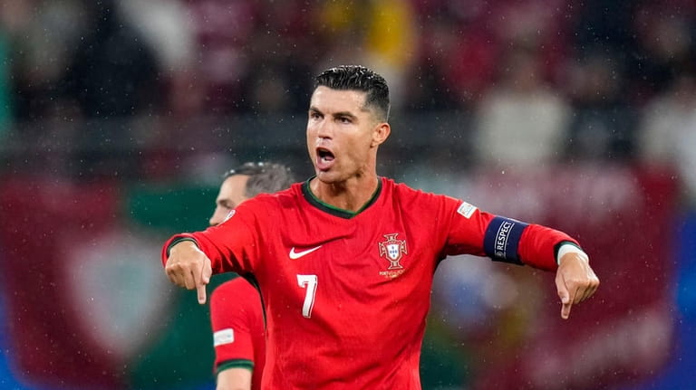 Portugal's Cristiano Ronaldo reacts after Czech Republic's Lukas Provod scoring...