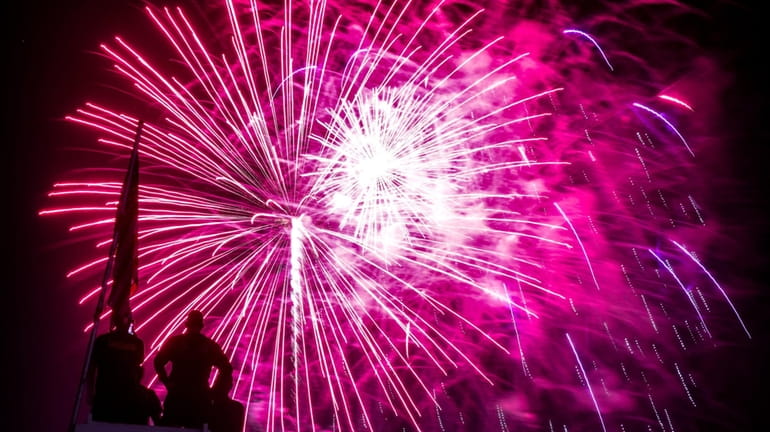 Fireworks explode over Jones Beach State Park on July 4,...