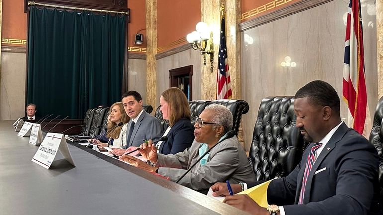 Members of the Ohio Ballot Board convene at the Ohio...