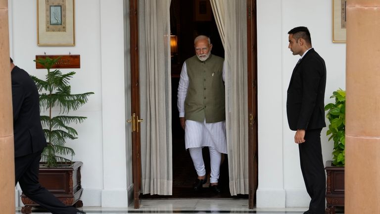 FILE- Indian Prime Minister Narendra Modi leaves to receive his...