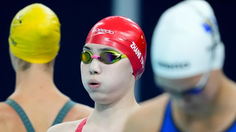 Zhang Yufei, of China, competes during a heat in the...