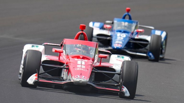 Marcus Ericsson, of Sweden, leads Alex Palou, of Spain, through...