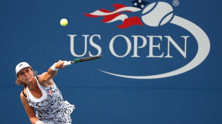 Varvara Lepchenko, of the United States, serves to Ana Konjuh,...