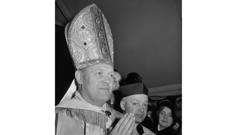 Then Rev. Christopher J. Weldon, Bishop of Springfield, Mass., prepares...