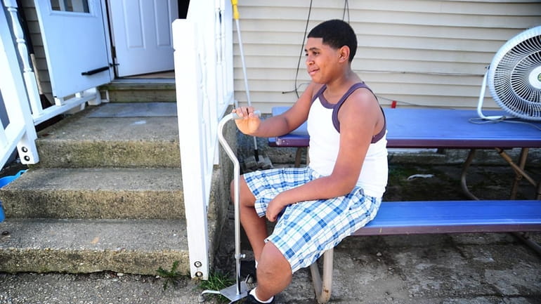 Gang violence victim, Wilson Batista Jr. at his home in...