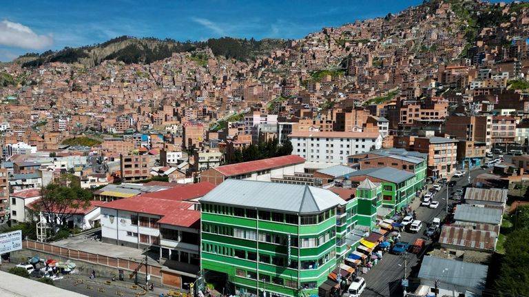 A legal coca leaf market stands on a corner in...