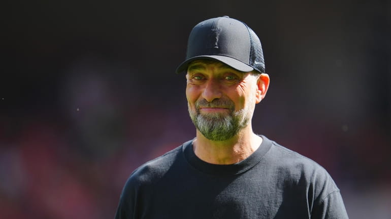 Liverpool's manager Jurgen Klopp smiles ahead the start of the...