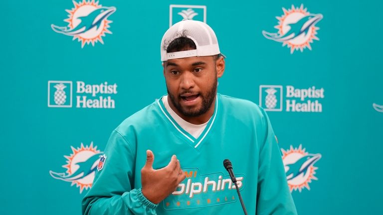 Miami Dolphins NFL football quarterback Tua Tagovailoa speaks during a...