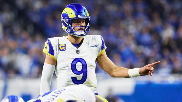 Los Angeles Rams quarterback Matthew Stafford gets set to run...