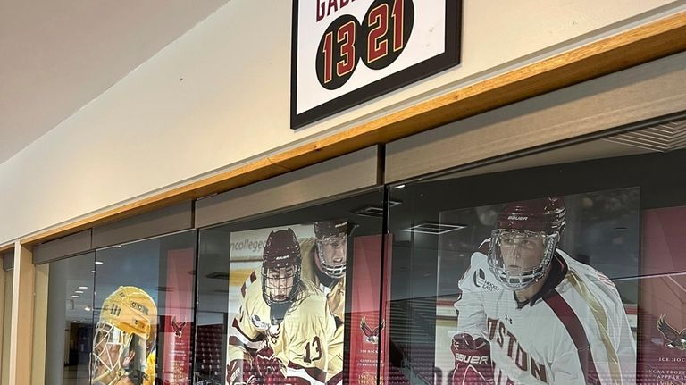 A sign hangs above the trophy case at Boston College's...