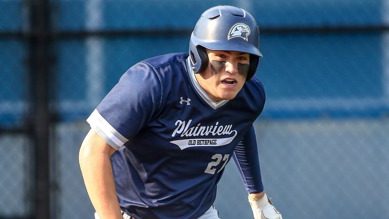 Michael D’Ambrosio of Plainview-Old Bethpage JFK runs to first base...