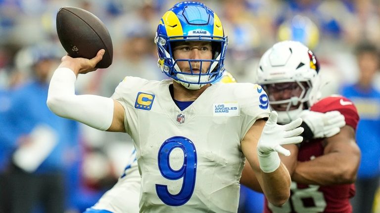 Los Angeles Rams quarterback Matthew Stafford (9) throws in the...