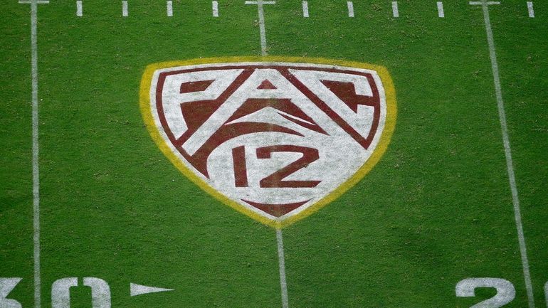 This Aug. 29, 2019, file photo shows the Pac-12 logo...