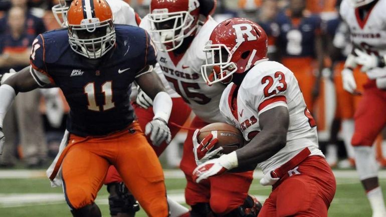 Rutgers' Jawan Jamison runs carries the ball agianst during an...