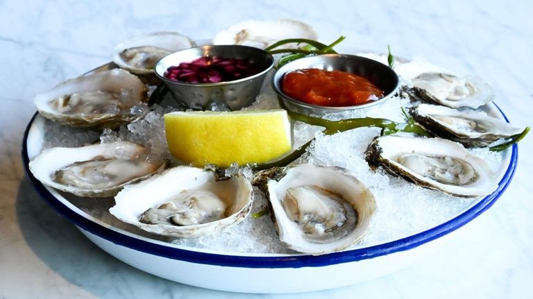 Oysters (Hibiscus mignonette black lime) at Montauk Project.