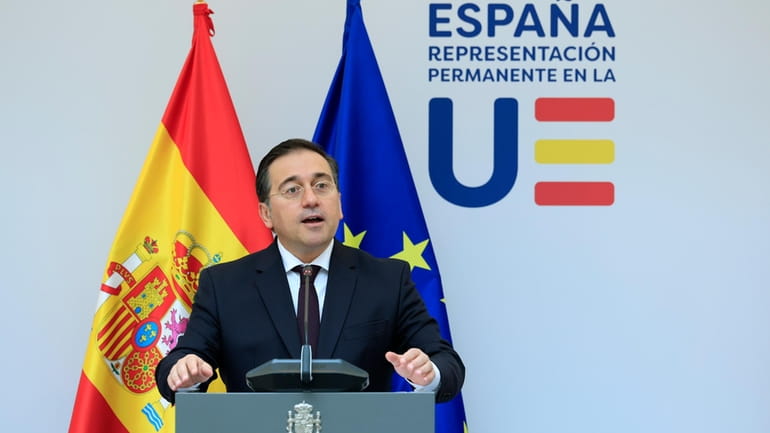 Spain's Foreign Minister Jose Manuel Albares Bueno addresses a media...