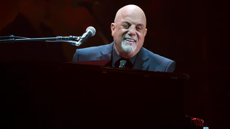 Musician Billy Joel performs during his 100th lifetime performance at...
