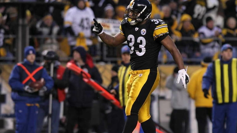 Running back Isaac Redman #33 of the Pittsburgh Steelers reacts...