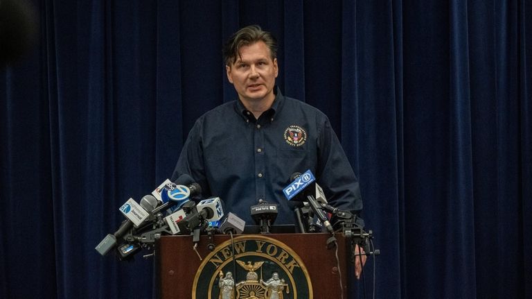 NTSB Investigator John Humm speaks to the media Friday in...