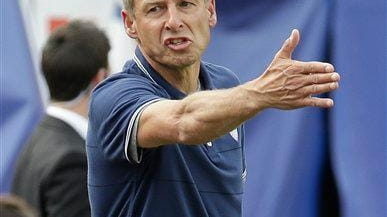 United States head coach Jurgen Klinsmann yells out to players...