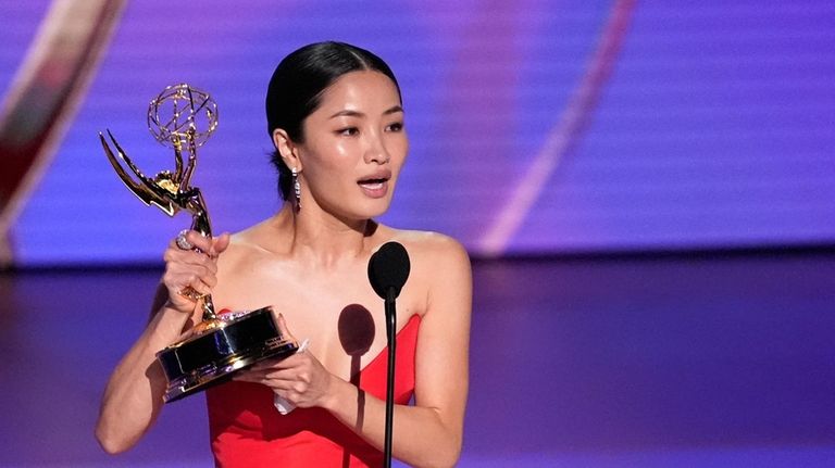 Anna Sawai accepts the award for outstanding lead actress in...