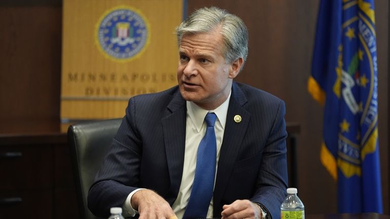 FBI Director Christopher Wray answers questions during an interview, Wednesday,...